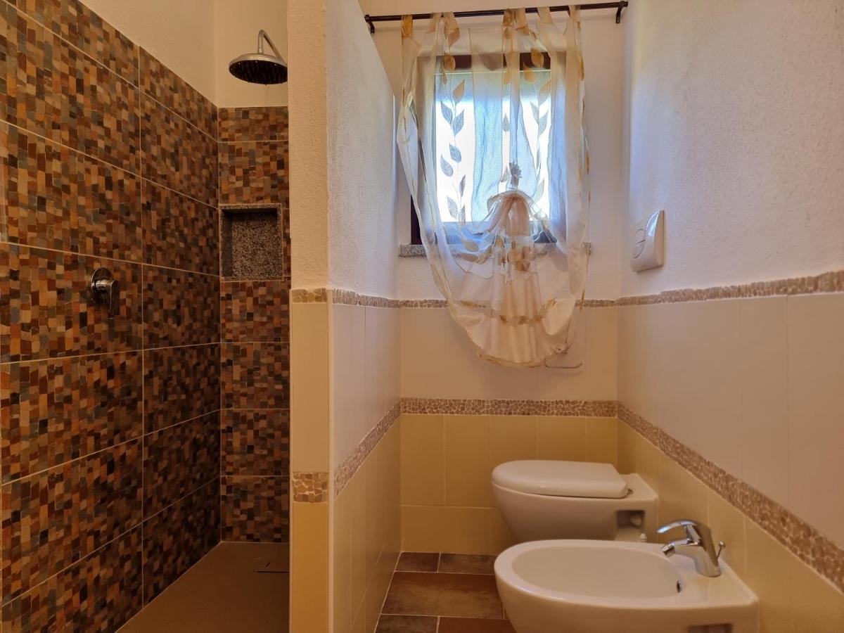 Villa Le Residenze Di Baia Sant'Anna à Tanaunella Extérieur photo